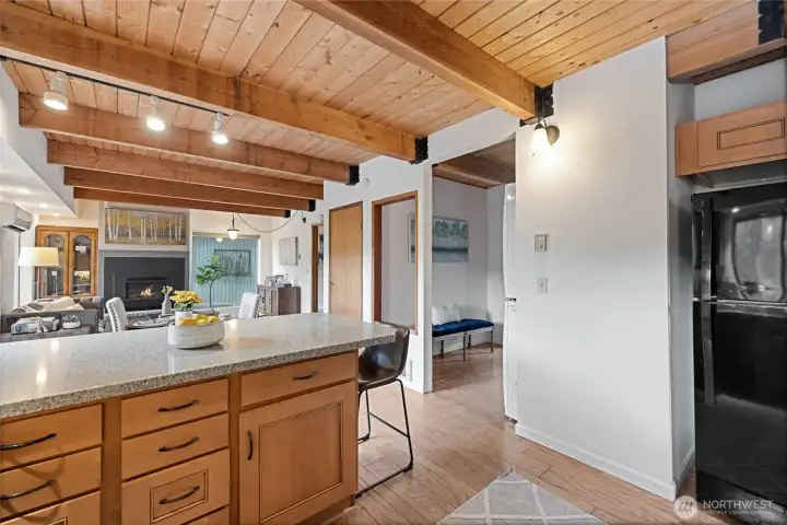 Kitchen with open concept to living room and dining room