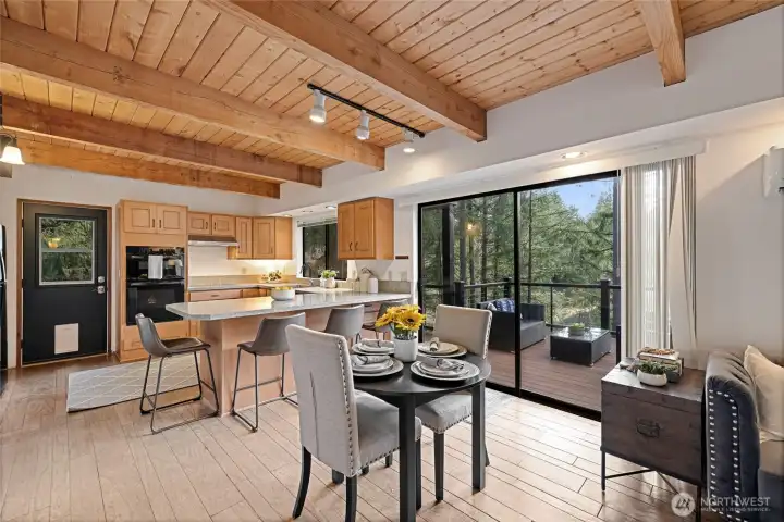 Kitchen with view of deck overlooking lake