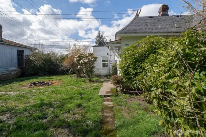 side.  garage / apartments at right (not in good shape presently)