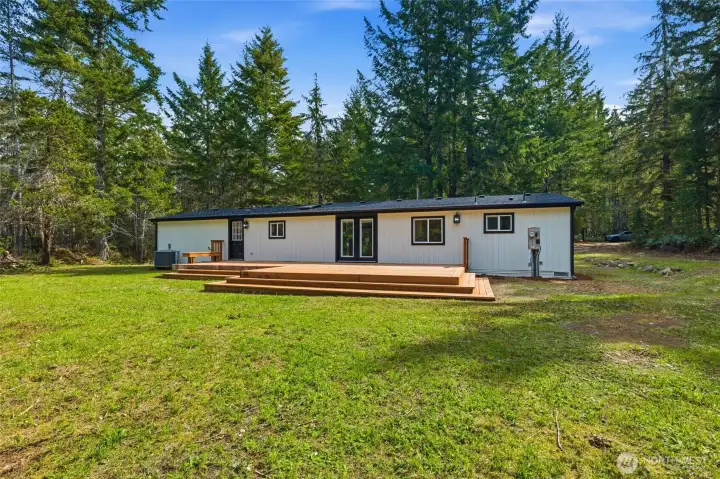 Expansive open backyard offering the perfect blend of privacy and outdoor living!