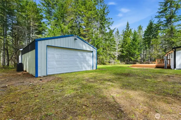 Detached Garage with additional designated workspace inside.