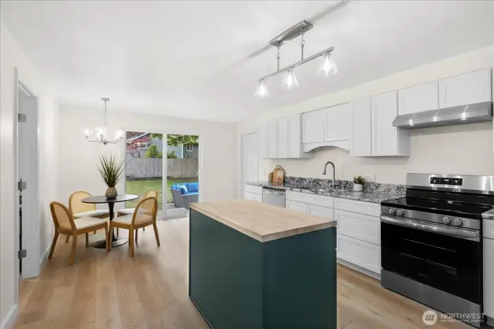 Freshly updated kitchen with slider to the backyard