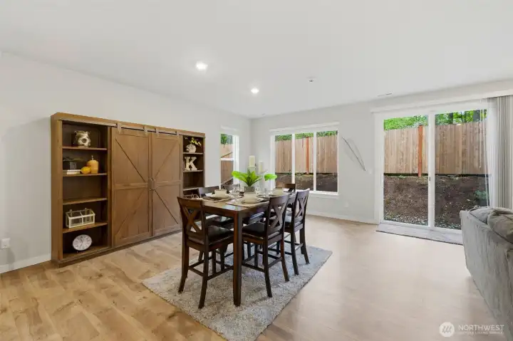 Another view of the dining room with sliders out to the back.