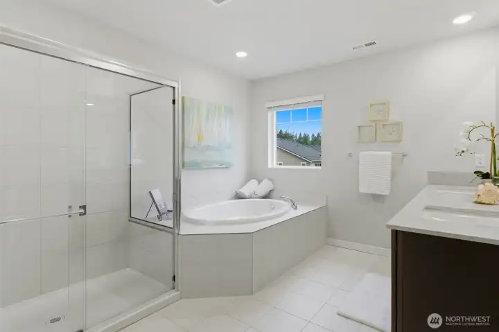 Be sure to make time for luxury relaxation in this spa-like bathroom.