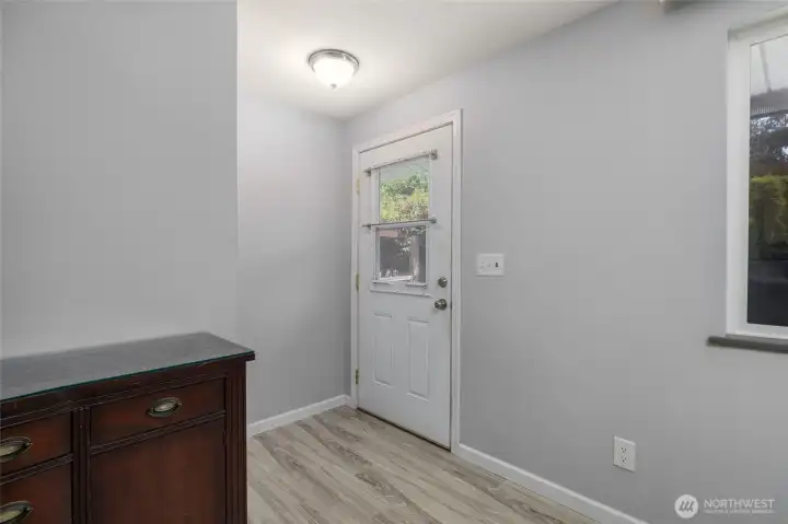 Entry way.  This side board furniture can stay if buyer wants it.