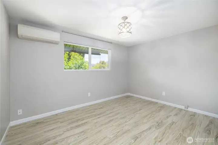 Primary Bedroom with mini split for heating and cooling.