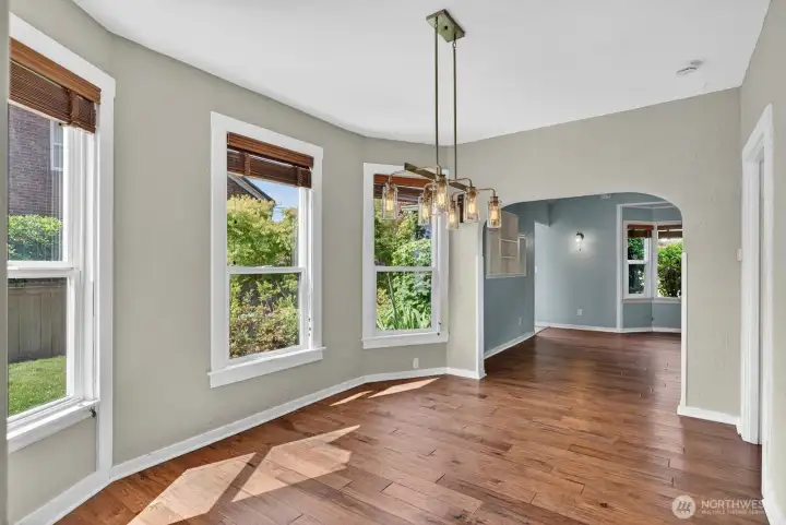 Dining room with lush green views of your backyard. Dining room with lush green views of your backyard.