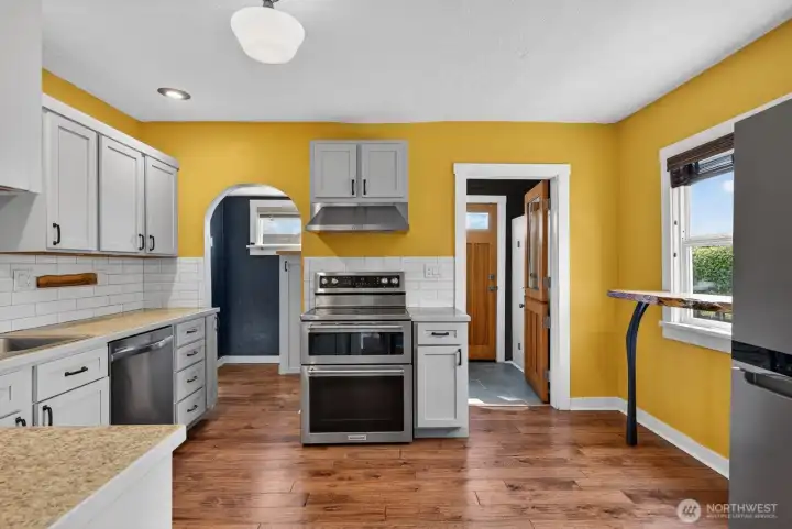 From the dining leads to spacious kitchen with access to the back yard and 3/4 bathroom on the main floor. From the dining leads to spacious kitchen with access to the back yard and 3/4 bathroom on the main floor.