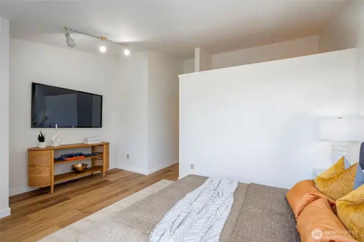 Primary bedroom with soaring ceiling