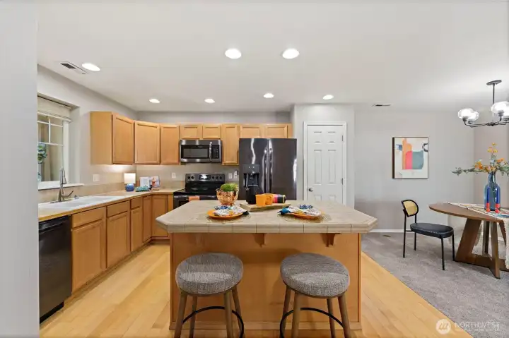 Kitchen with breakfast bar island and pantry