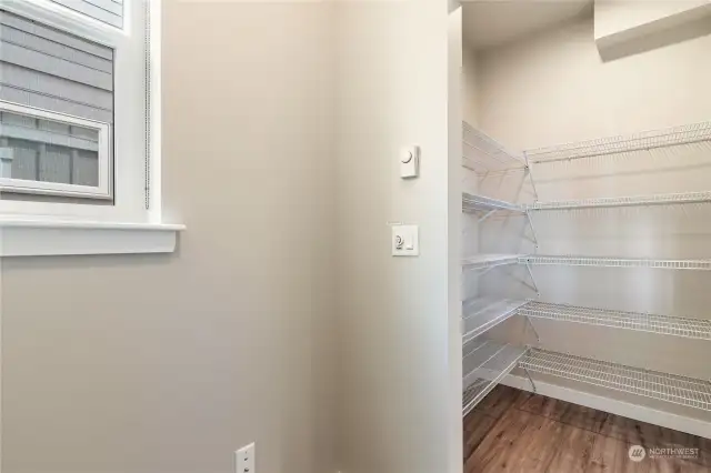This is the extra space in large pantry.  Even has outlet if you choose to put in a desk area.