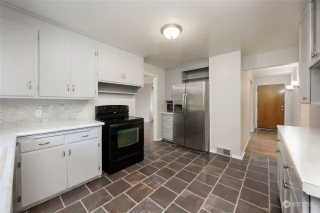 Updated kitchen with added cabinets and counter space.