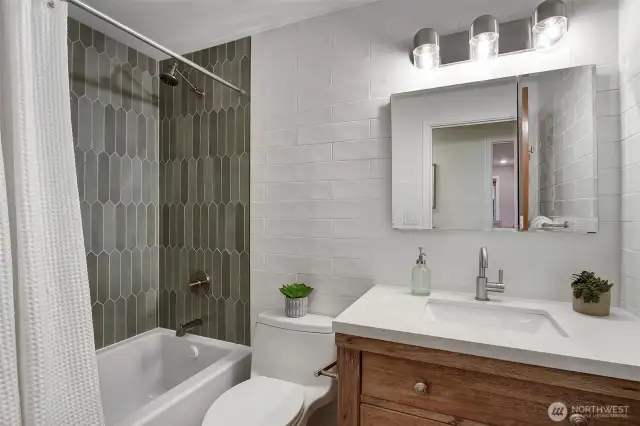 This full bath off the hallway was remodeled in 2022 (more beautiful tile work!)