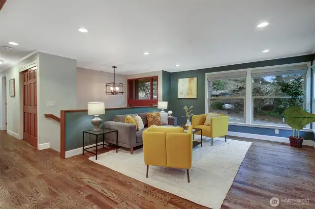 New red oak hardwoods & light fixtures elevate the main living level.