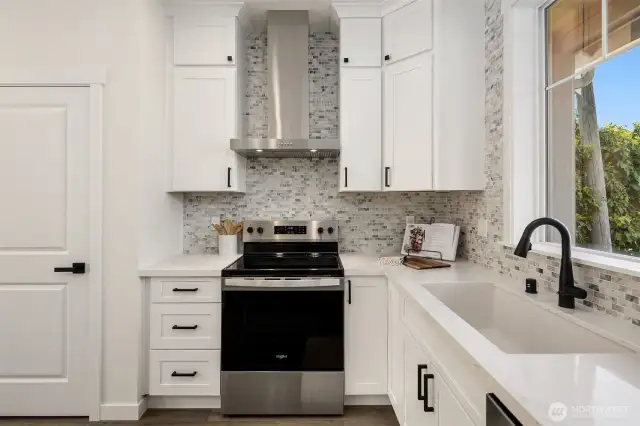 Kitchen featuring stainless steel appliances and pantry.