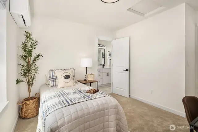Bedroom with access to bathroom.