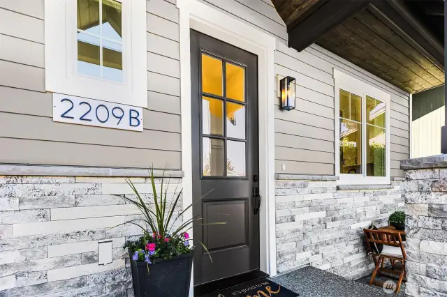 Covered front entry to home.