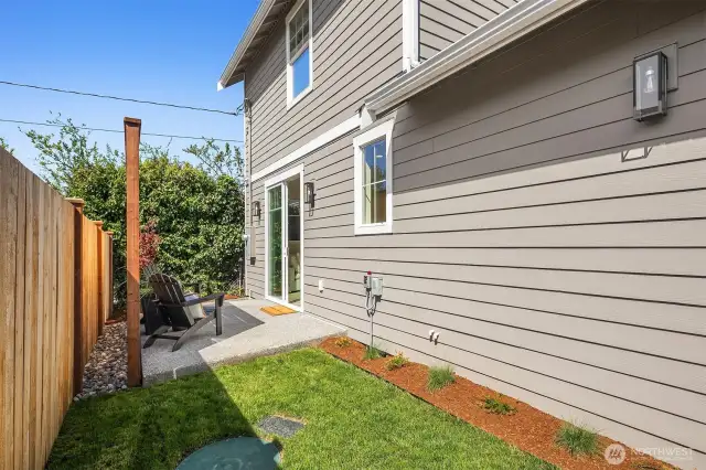 Backyard space offering ample room for outdoor entertainment.