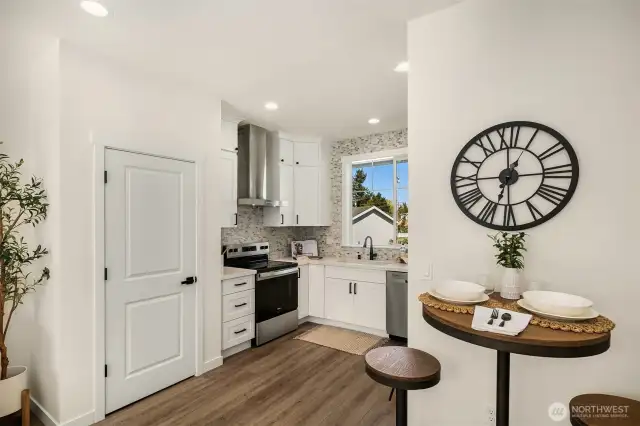 Kitchen featuring breakfast nook area.