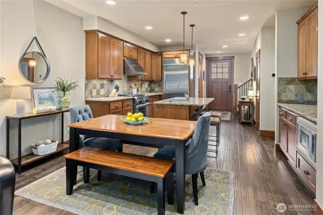Seating for 8 with the kitchen island and table.