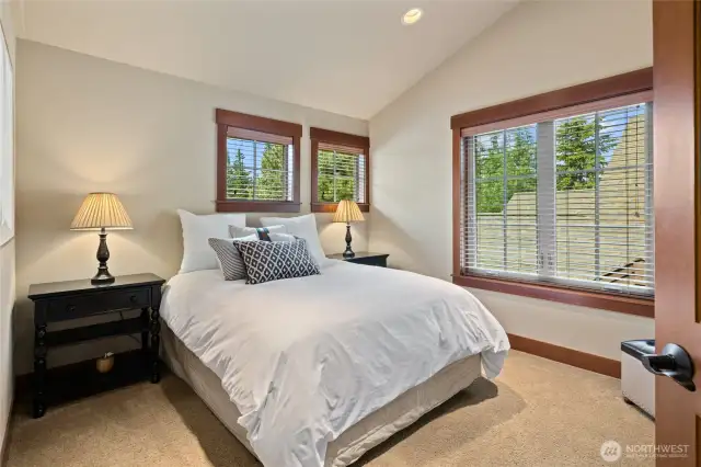 Bedroom three is upstairs and has beautiful blue or snowy sky views.