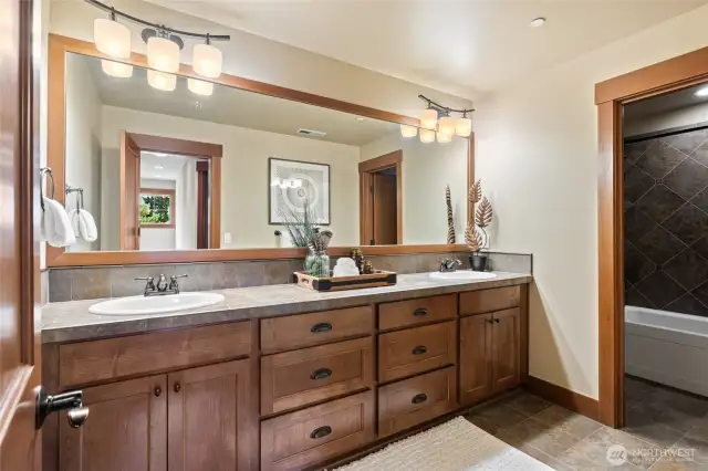 The spacious upstairs bathroom is between bedrooms two and three.