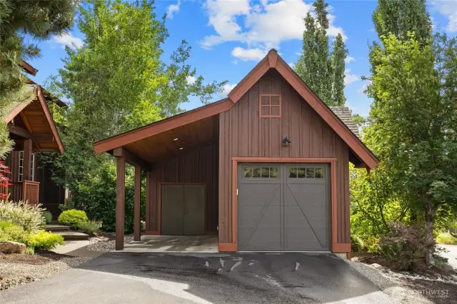 The detached single car garage AND single car carport with storage. BONUS! The garage has beautiful epoxy floors.