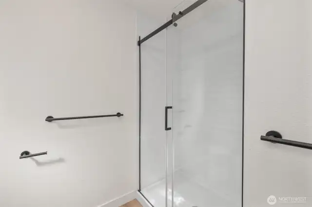 Frameless glass shower in primary ensuite