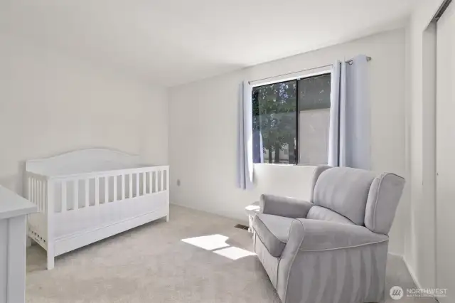 Upstairs Bedroom #2 with the window overlooking the backyard.