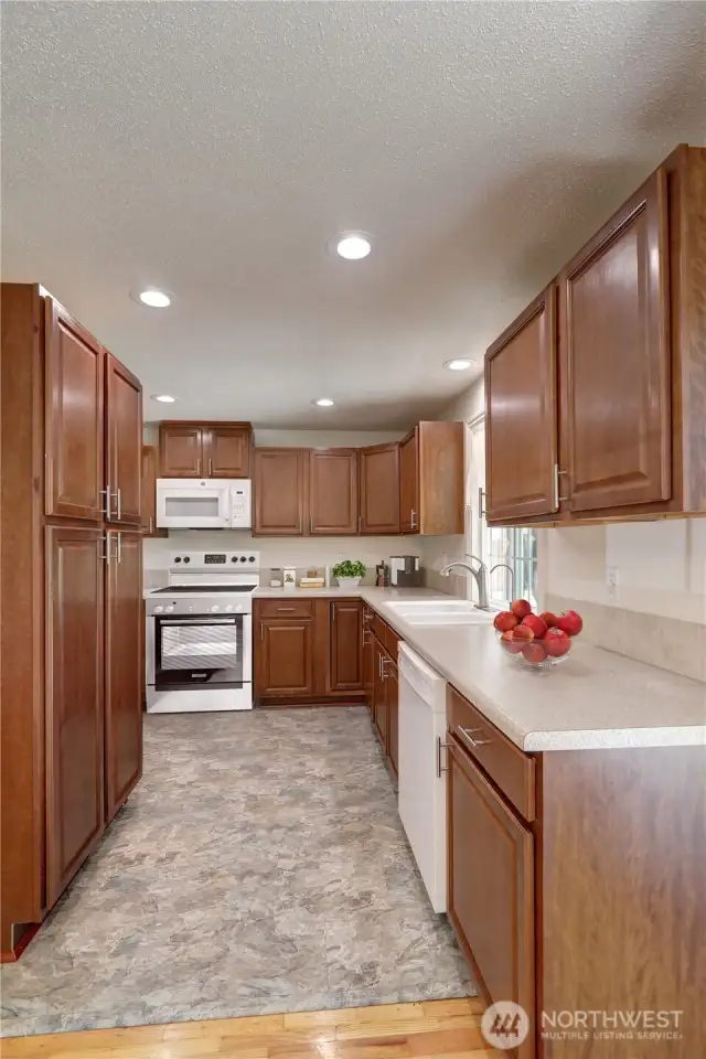 Kitchen with lots of cabinet and counter space  - This stove is not the correct one - A new stove is coming soon.