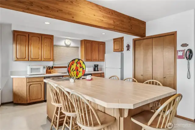 Pantry closet to the right provides lots of kitchen storage.