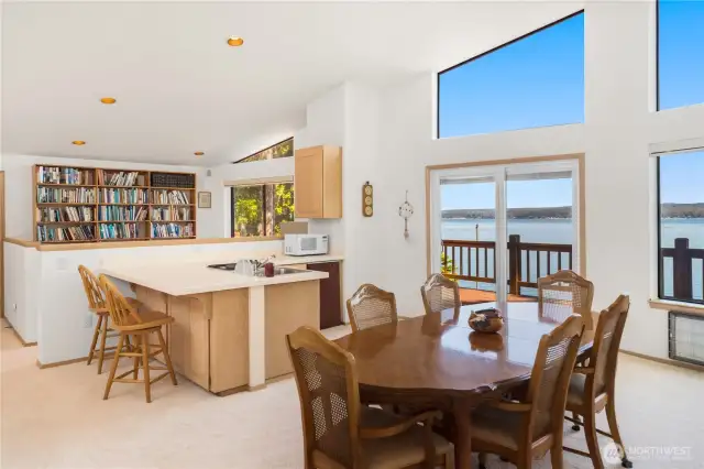 Upstairs second kitchen includes a convenient breakfast bar—perfect for casual dining and entertaining.