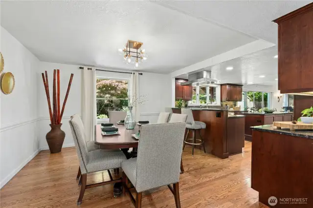 Formal dining room with open access to kitchen