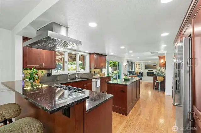 Remodeled kitchen with cherrywood cabinets, granite counters and SS appliances