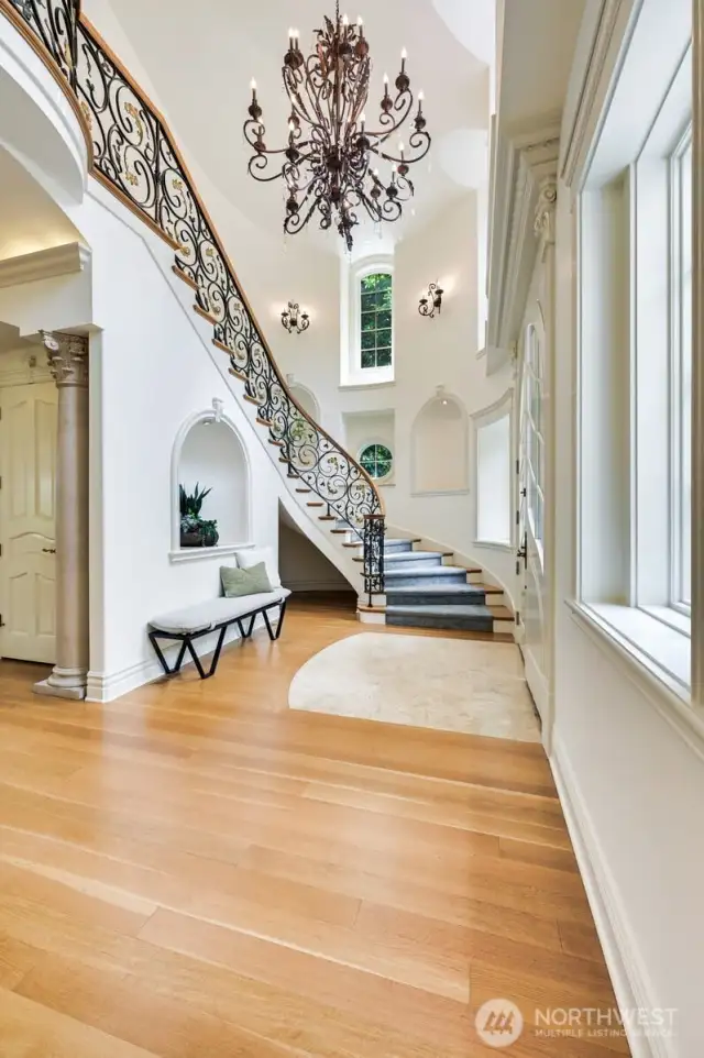 Wrought iron handrail and Italian crystal chandelier