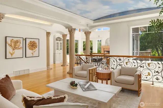 Family room next to staircase to downstairs