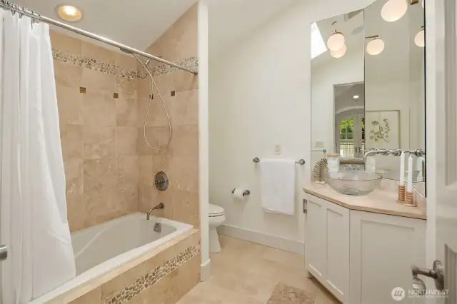 2nd bedroom suite on upper floor with full bathroom