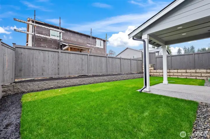 Landscaped and fenced yards