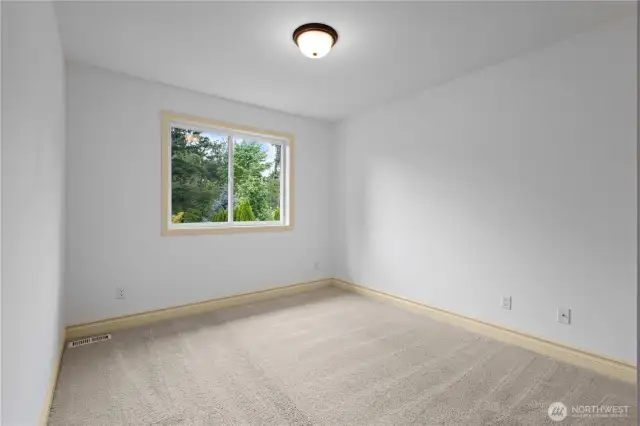 Light and airy design carries through all bedrooms.