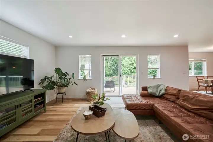 Another look at the living room. No neighbors behind you, just forest. Also, the informal dining area is to the right in the photo.
