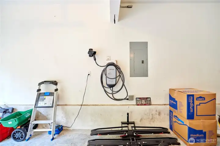 The 2 car garage features an Enphase car charger.