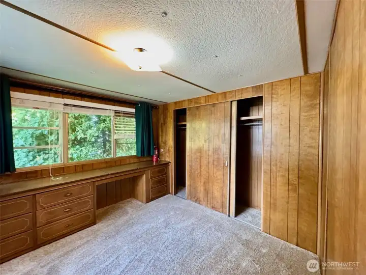 Large windows in the bedroom.