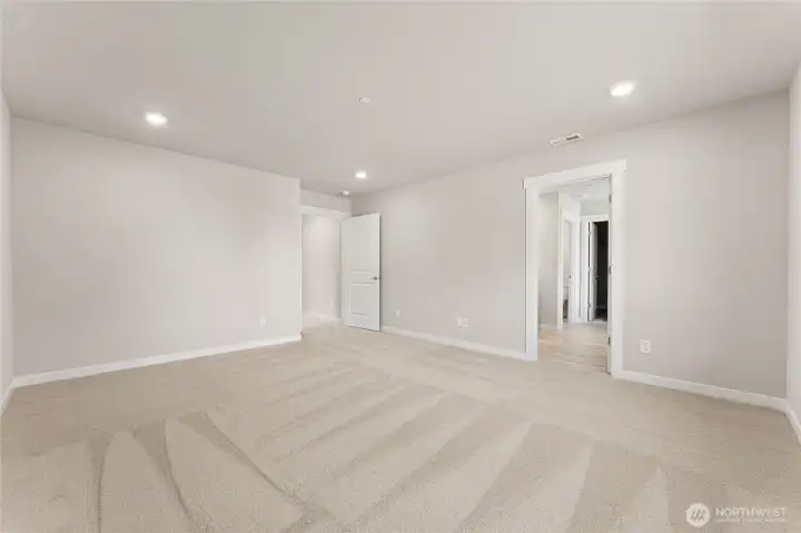 Primary bedroom big enough for a king or cali king bed. Pictures are for representational purposes only, colors and features may vary.