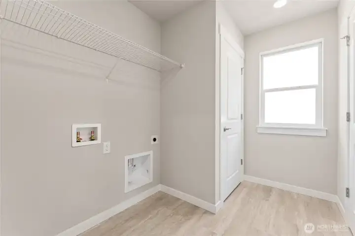 Laundry room upstairs. Primary bedroom big enough for a king or cali king bed. Pictures are for representational purposes only, colors and features may vary.