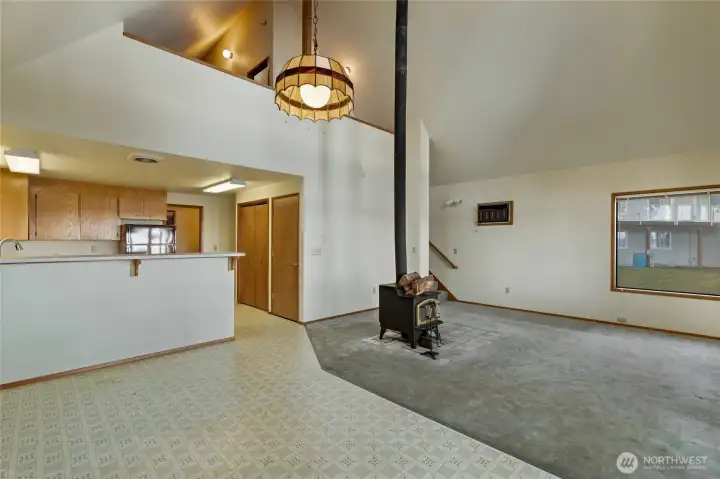 Open kitchen & living. Bonus space & 1 bedroom upstairs.