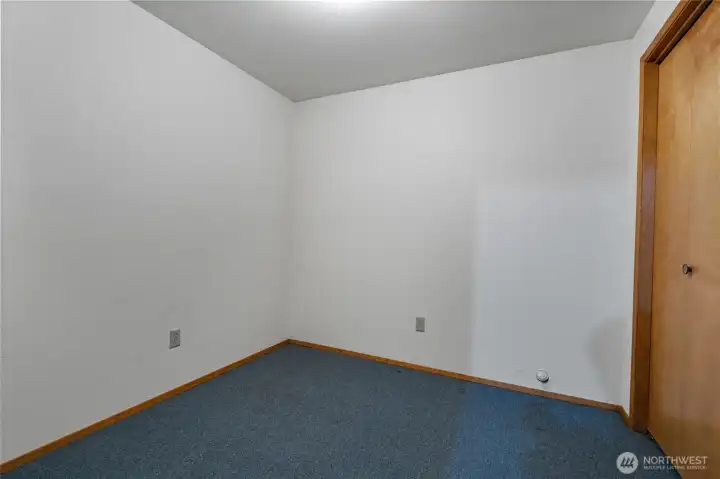 1 of two finished rooms in basement.