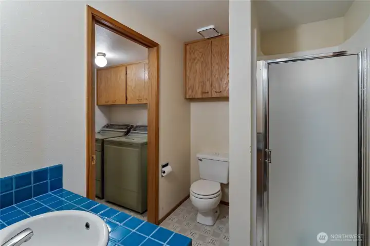 3/4 Bath downstairs with laundry room attached.