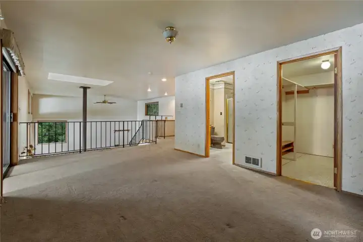 Another view of the loft with 3/4 bath & large walk in closet.