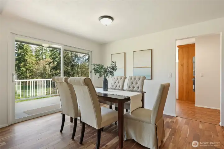 Amazing dining area with large slider that opens to the back deck