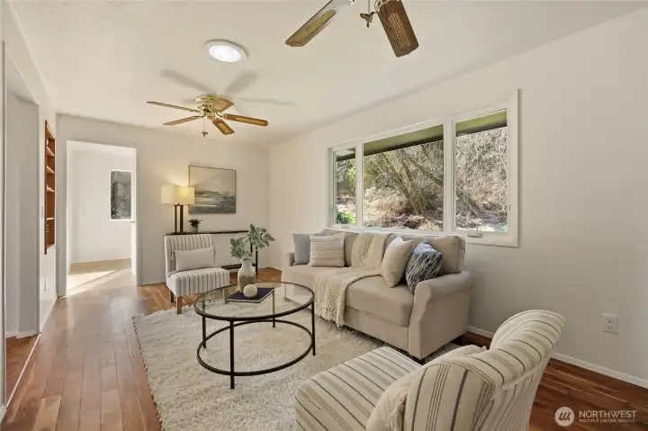 Living room that could serve multiple functions. It could also be a great den, home office, or exercise room!